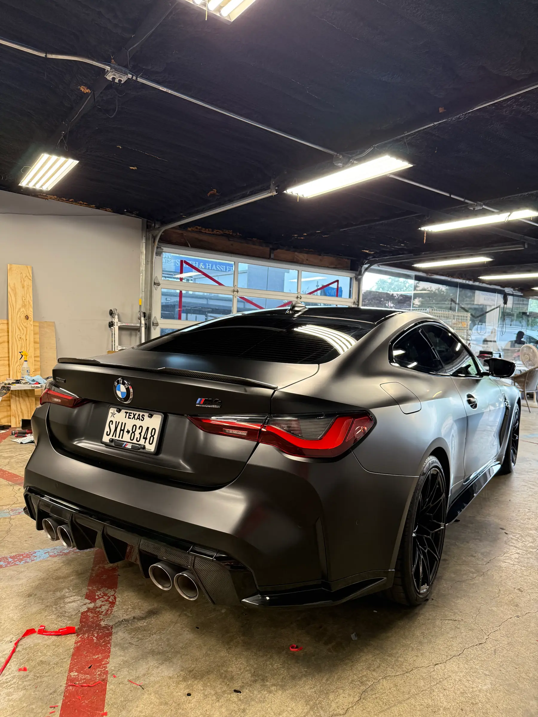 BMW M4: Satin Grey wrap, rear three-quarter