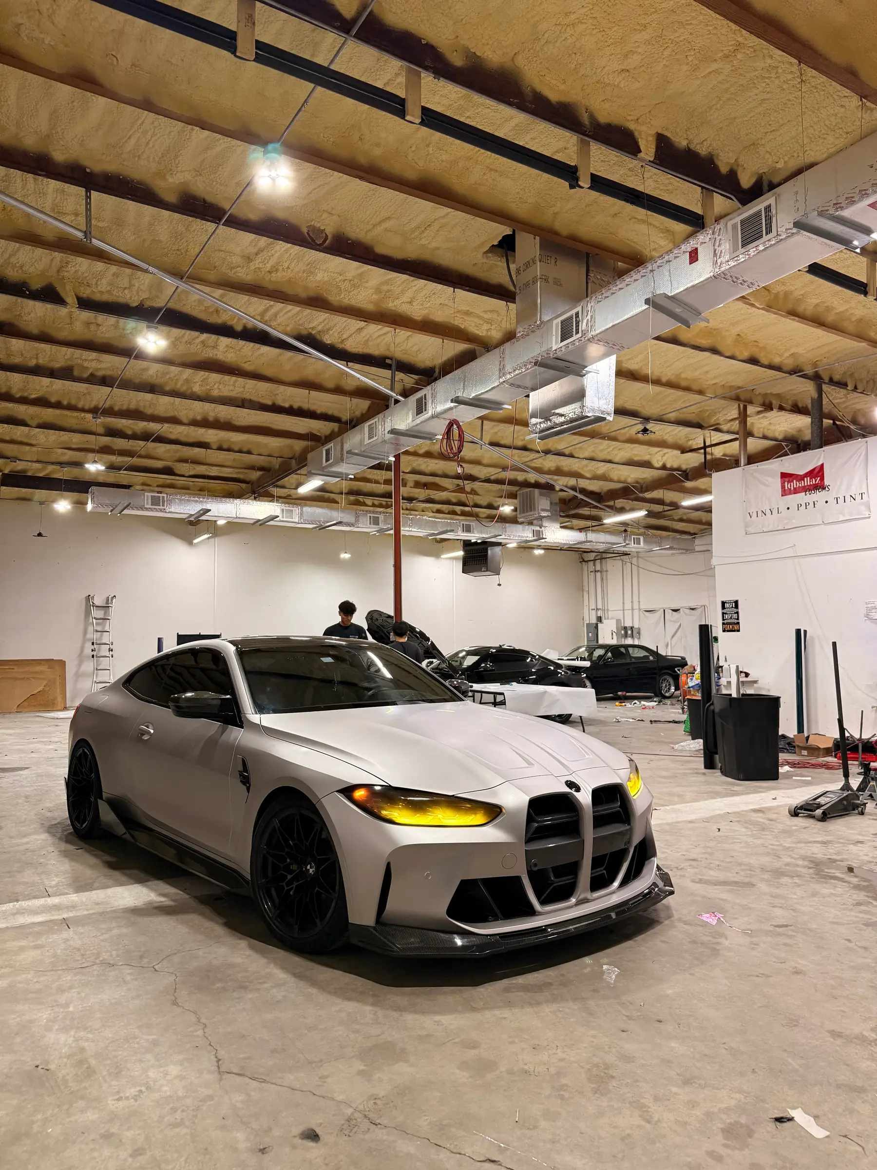 BMW M4 Competition: Alpine White wrap, front