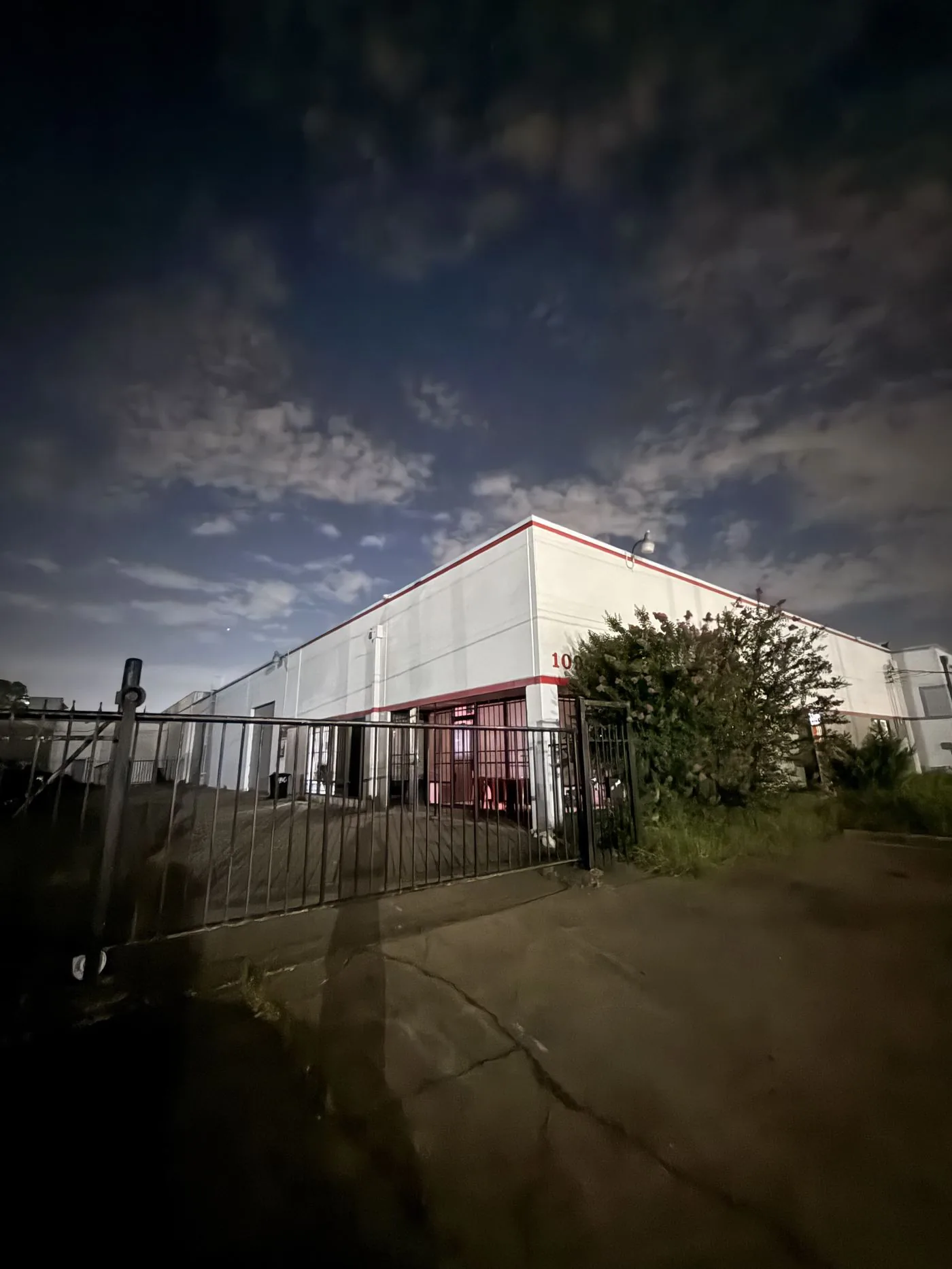 Iqballaz Customs storefront at night
